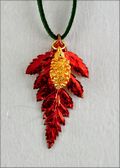 Double Small Iridescent Fern Necklace with Gold Pine Cone on Leather Cord